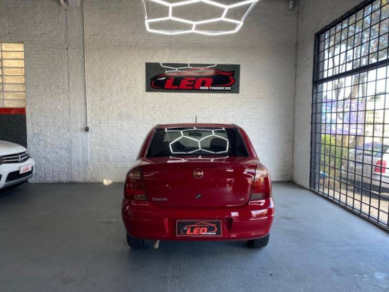 CHEVROLET - CORSA - 2009/2010 - Vermelha - R$ 30.900,00